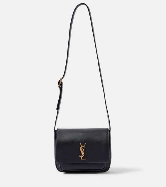 Saint Laurent Niki leather messenger bag. Shop Saint Laurent Shoulder Bags for women now.