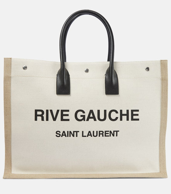 Saint Laurent Rive Gauche canvas tote. Shop Saint Laurent Tote Bags for women now.