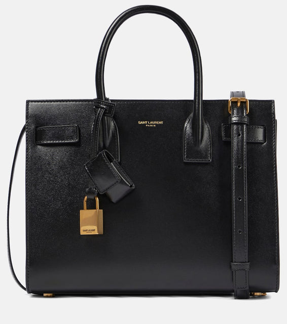 Saint Laurent Sac De Jour Baby leather tote. Shop Saint Laurent Top-Handle Bags for women now.