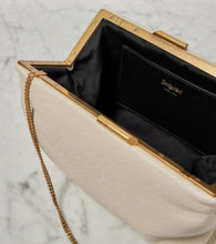 Saint Laurent Small leather clutch with chain
