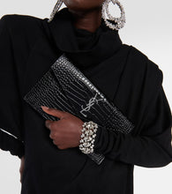 Saint Laurent Uptown embossed leather clutch