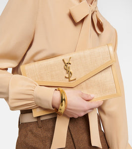 Saint Laurent Uptown leather-trimmed raffia clutch