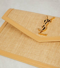 Saint Laurent Uptown leather-trimmed raffia clutch