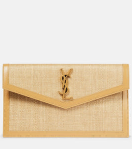 Saint Laurent Uptown leather-trimmed raffia clutch. Shop Saint Laurent Clutches for women now.