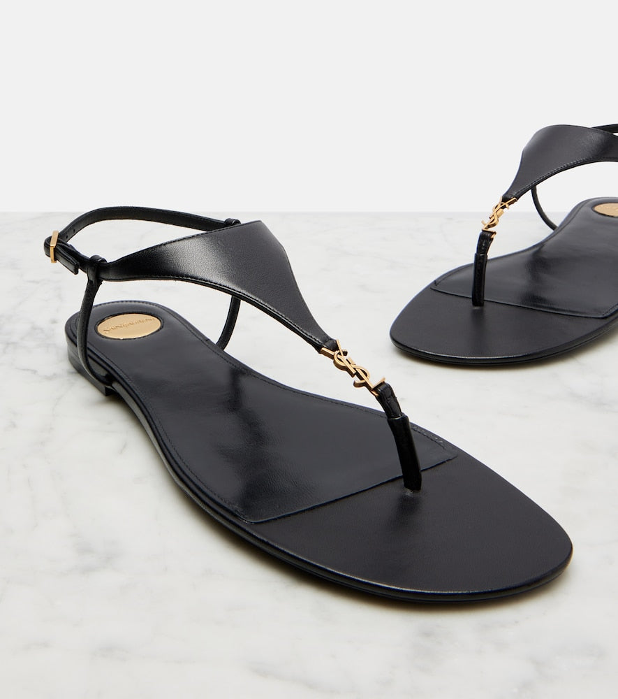 Saint Laurent Cassandre leather thong sandals - Black Flat Sandals