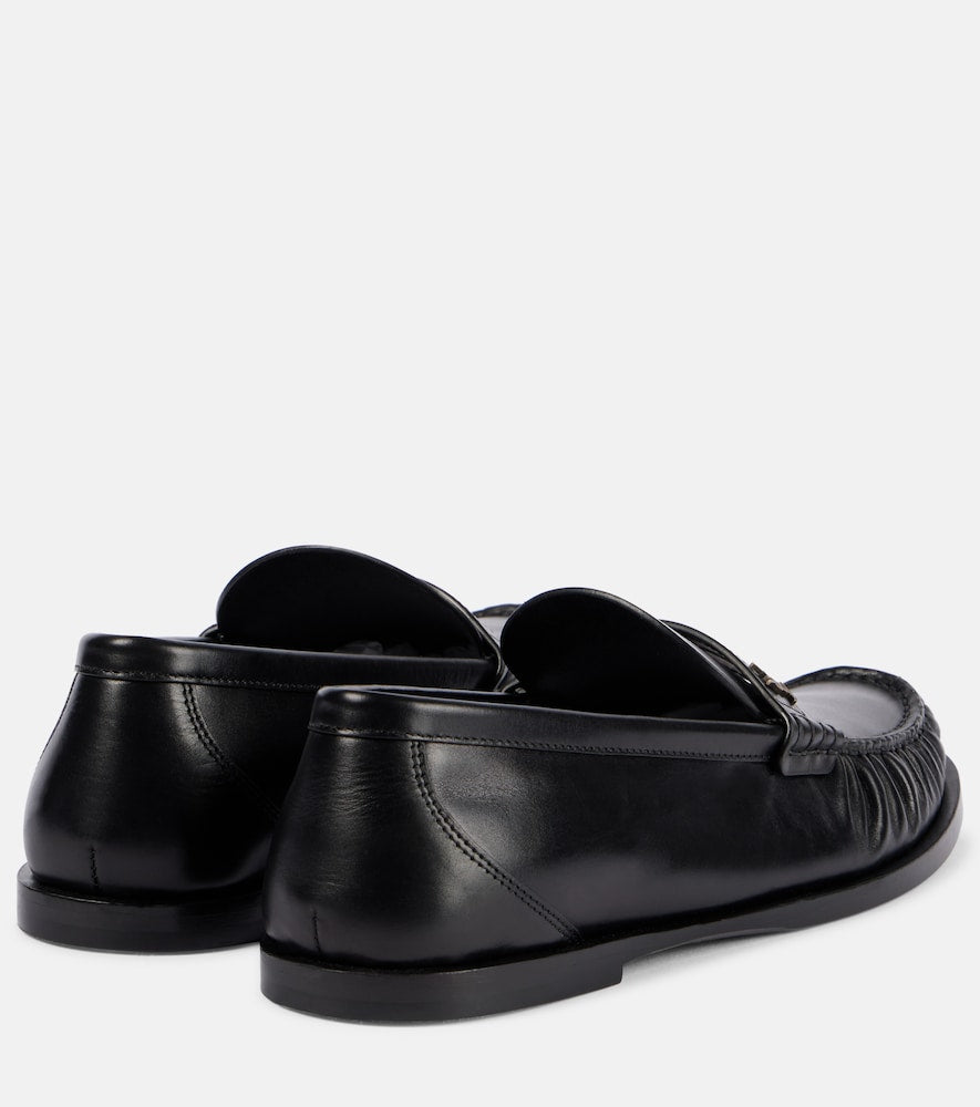 Black Saint Laurent Laurent leather penny loafers - Loafers