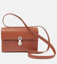 Savette Symmetry 19 leather shoulder bag. Shop Savette Crossbody Bags for women now.