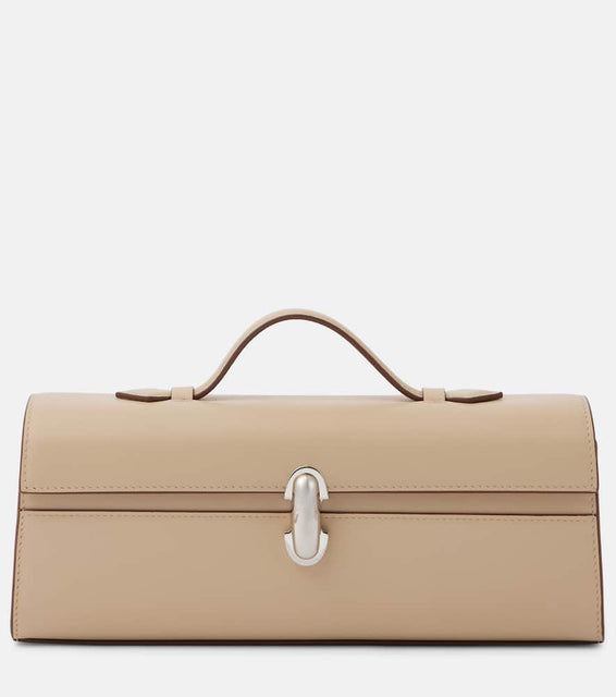 Savette Symmetry Pochette Slim leather tote bag. Shop Savette Top-Handle Bags for women now.