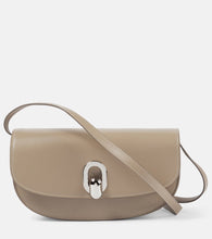 Savette Tondo Crescent leather shoulder bag. Shop Savette Shoulder Bags for women now.
