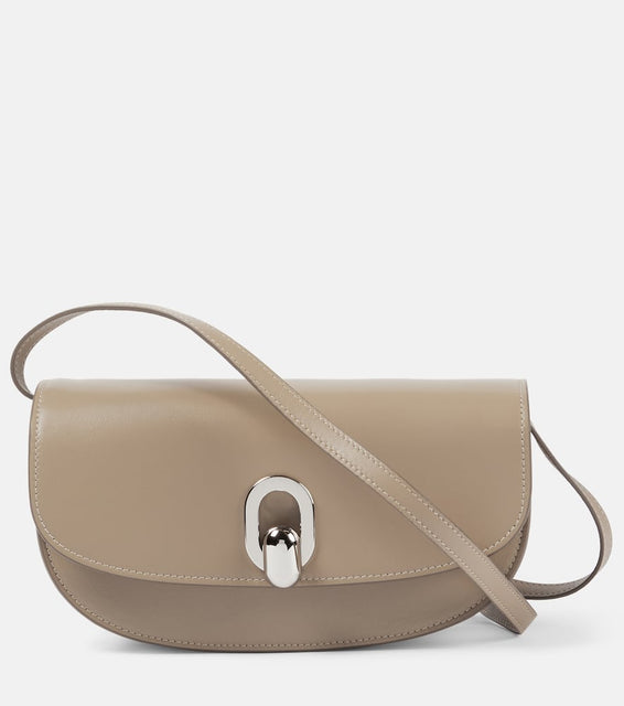 Savette Tondo Crescent leather shoulder bag. Shop Savette Shoulder Bags for women now.