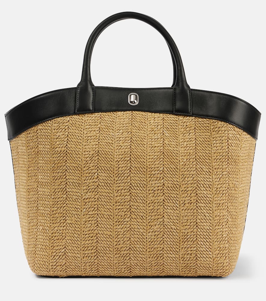 Savette Tondo Large leather-trimmed raffia tote bag. Shop Savette Beach Bags for women now.