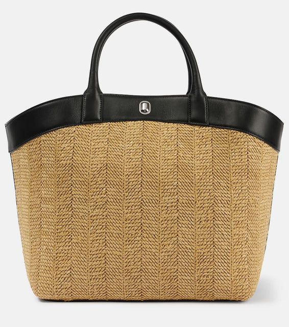 Savette Tondo Large leather-trimmed raffia tote bag. Shop Savette Beach Bags for women now.