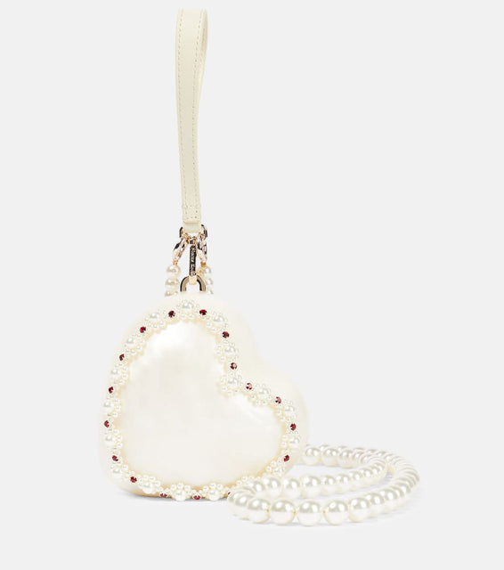 Simone Rocha Heart faux pearl-embellished clutch. Shop Simone Rocha Shoulder Bags for women now.
