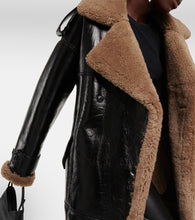 The Mannei Jordan shearling-trimmed leather coat