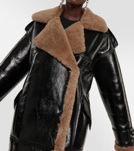 The Mannei Jordan shearling-trimmed leather coat