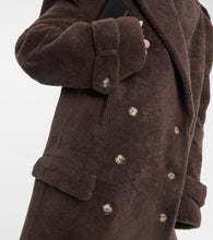 The Mannei Rutul oversized faux fur-trimmed coat