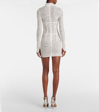 The New Arrivals Ilkyaz Ozel Isadora mockneck lace minidress