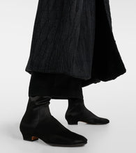 The Row Awar satin over-the-knee boots