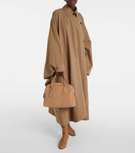 The Row Awar suede over-the-knee boots