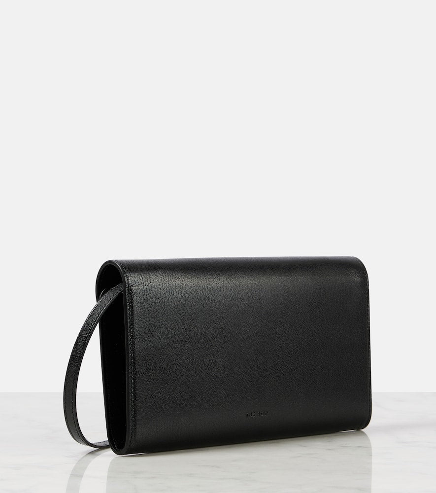 The Row Evening leather clutch