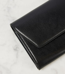 The Row Evening leather clutch