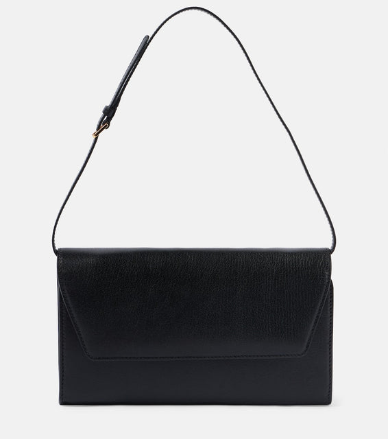The Row Evening leather clutch. Shop The Row Shoulder Bags for women now.