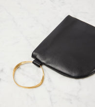 The Row Geo leather clutch