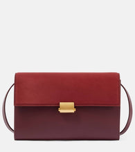 The Row Laurie leather crossbody bag. Shop The Row Crossbody Bags for women now.