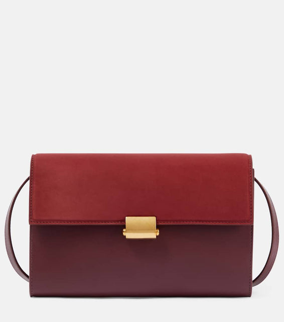 The Row Laurie leather crossbody bag. Shop The Row Crossbody Bags for women now.