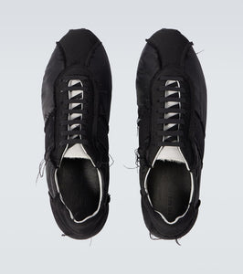 The Row Moveo distressed sneakers