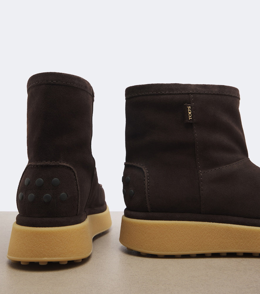Tod's Gommino  shearling-lined suede ankle boots in Brown - Flat Boots