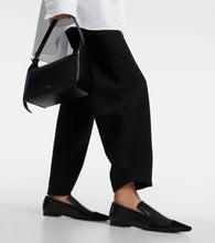 Toteme Leather and calf hair loafers