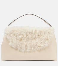 Toteme T-Lock Large shearling-trimmed shoulder bag. Shop Toteme Top-Handle Bags for women now.