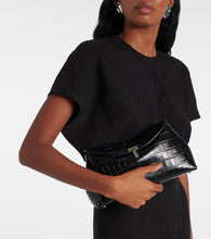 Toteme T-Lock croc-effect leather clutch