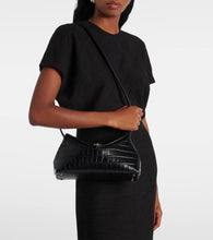 Toteme T-Lock croc-effect leather clutch