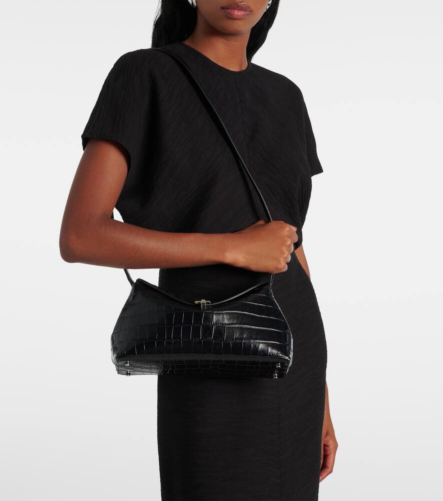 Toteme T-Lock croc-effect leather clutch
