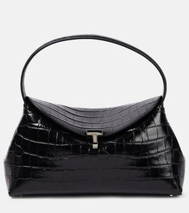 Toteme T-Lock croc-effect leather clutch. Shop Toteme Clutches for women now.