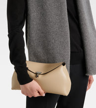 Toteme T-Lock leather clutch