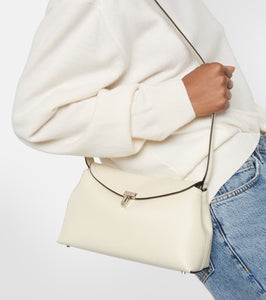 Toteme T-Lock leather clutch