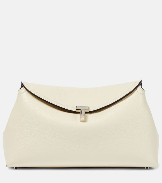 Toteme T-Lock leather clutch. Shop Toteme Clutches for women now.