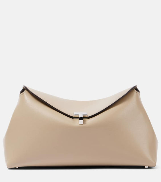 Toteme T-Lock leather clutch. Shop Toteme Clutches for women now.