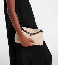 Toteme T-Lock leather-trimmed canvas clutch