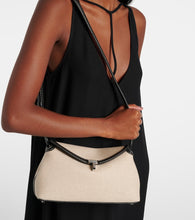 Toteme T-Lock leather-trimmed canvas clutch