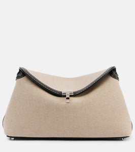Toteme T-Lock leather-trimmed canvas clutch. Shop Toteme Clutches for women now.