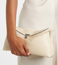 Toteme T-Lock shearling-lined leather clutch