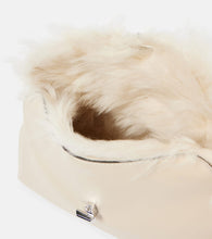 Toteme T-Lock shearling-lined leather clutch