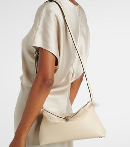 Toteme T-Lock shearling-lined leather clutch