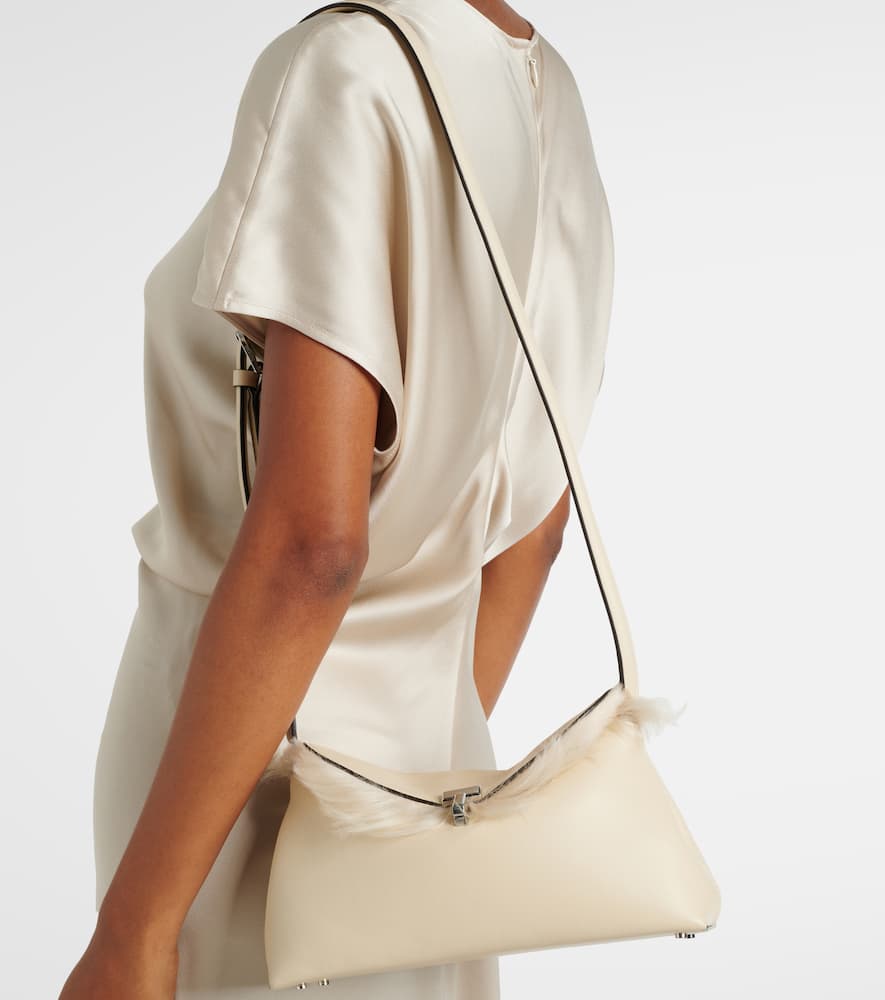 Toteme T-Lock shearling-lined leather clutch