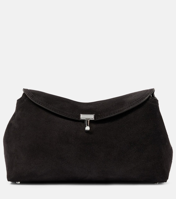 Toteme T-Lock suede clutch. Shop Toteme Shoulder Bags for women now.