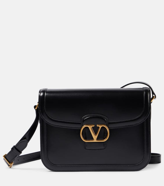 Valentino Garavani 9TO5 VLogo Signature leather shoulder bag. Shop Valentino Garavani Crossbody Bags for women now.